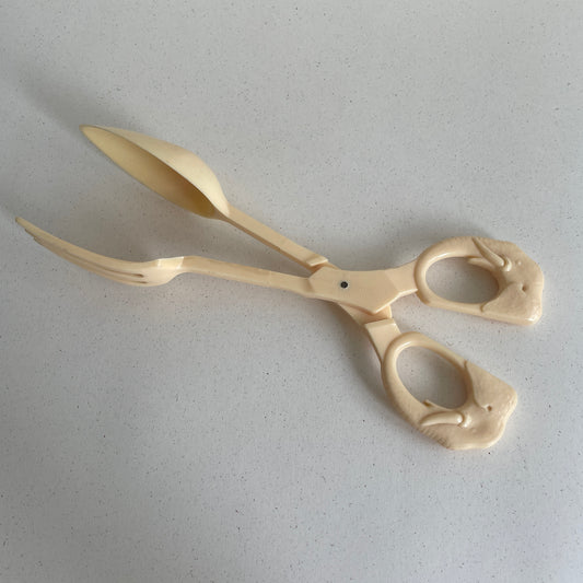 Salad tongs with elephant handles