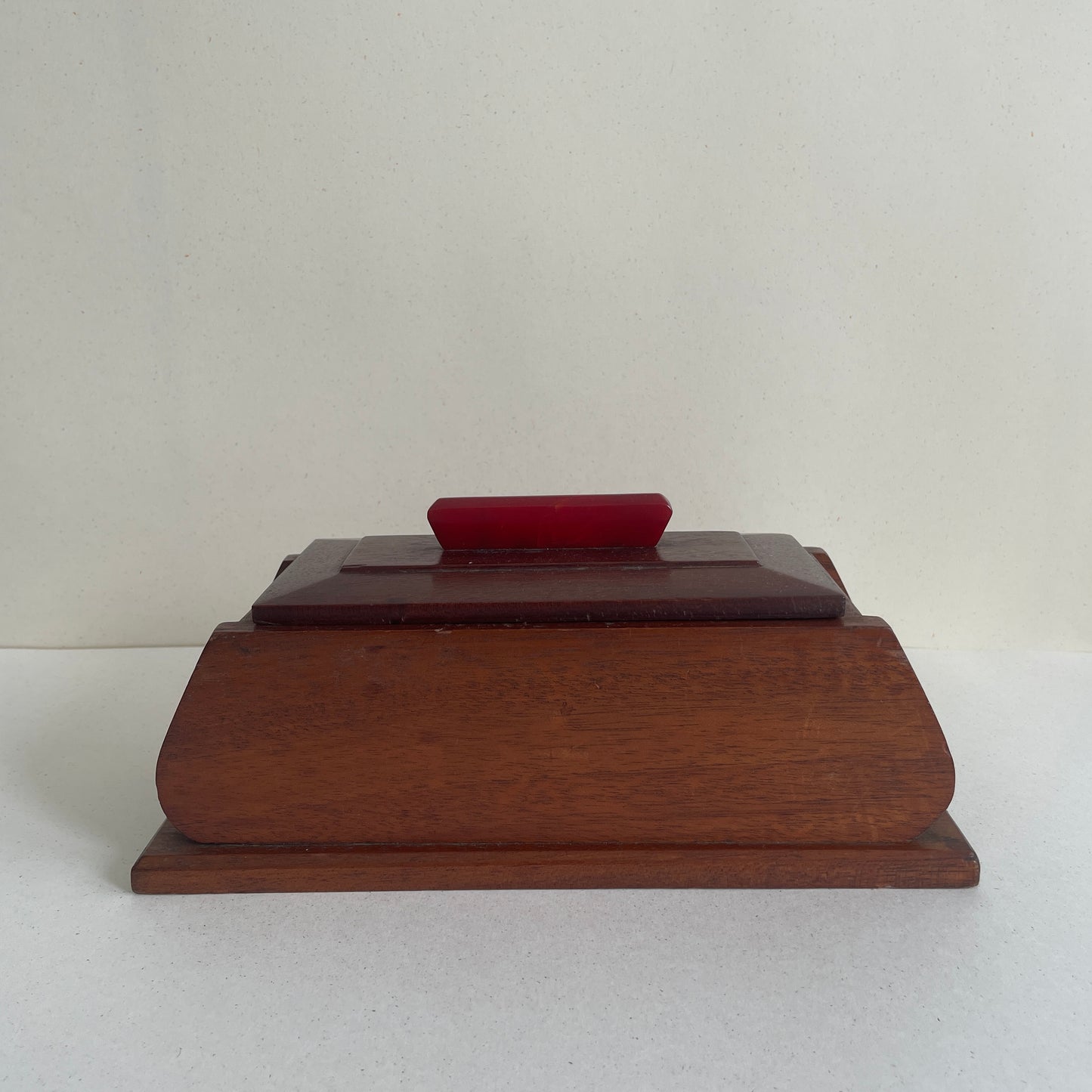 Art deco wooden box with red marbled Bakelite handle