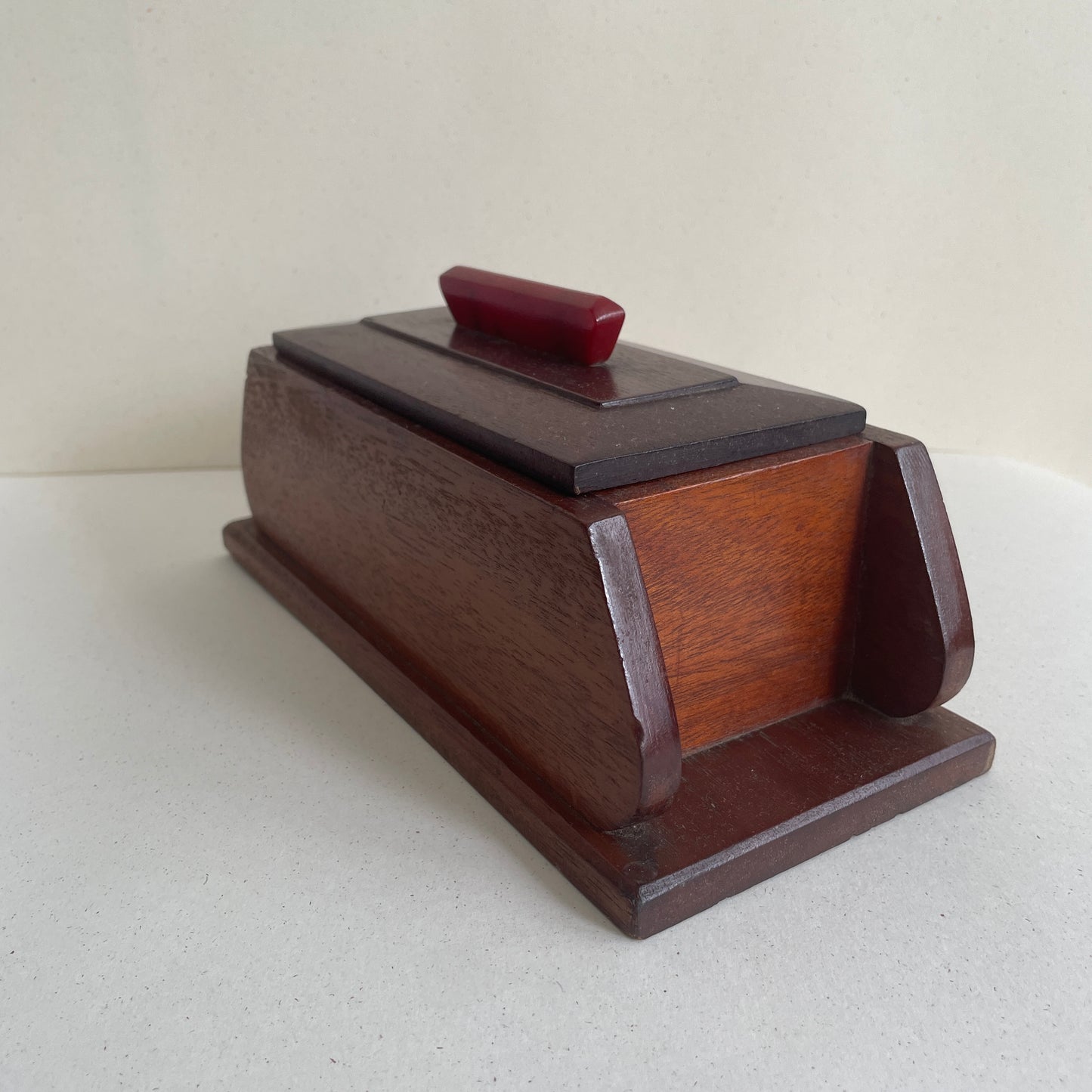 Art deco wooden box with red marbled Bakelite handle