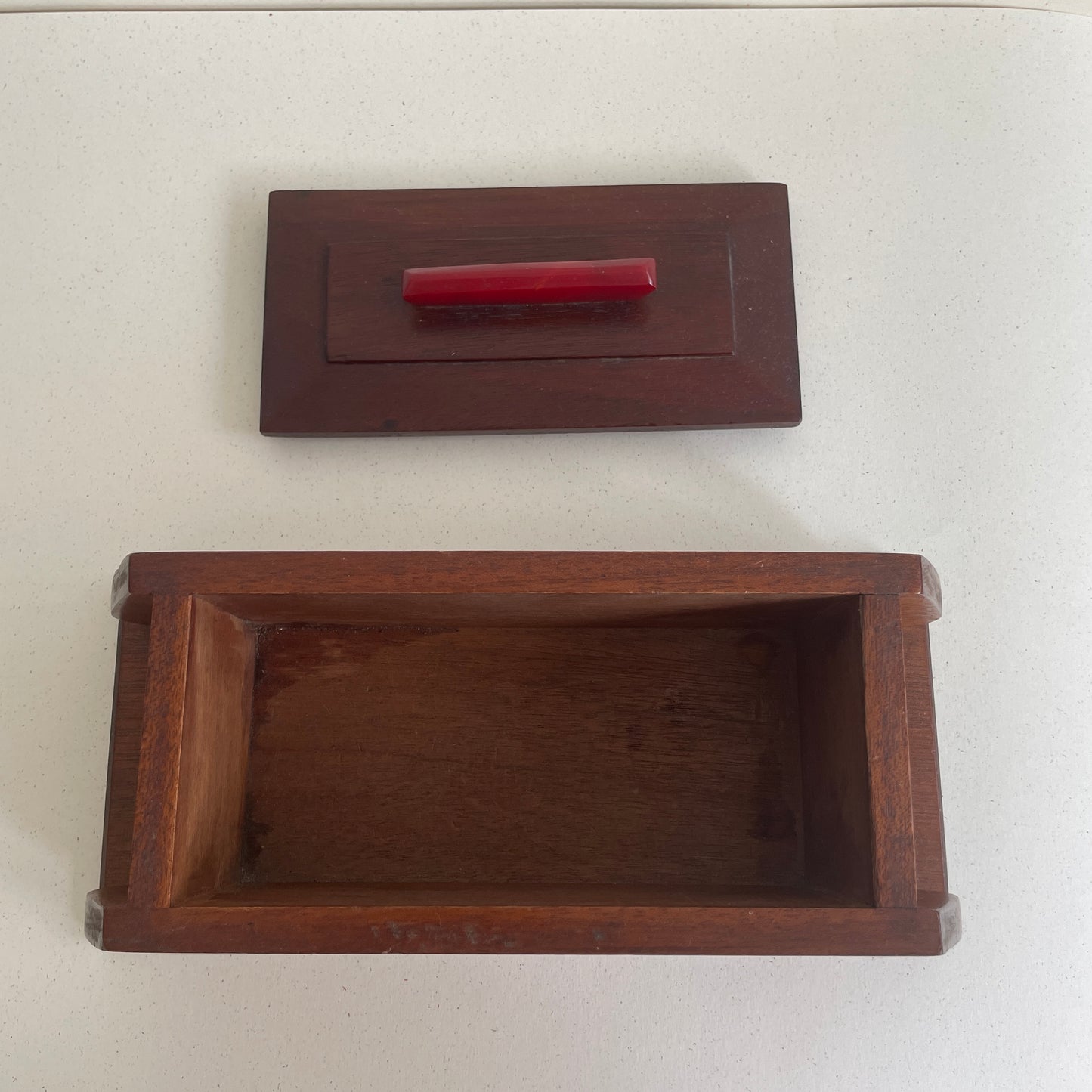 Art deco wooden box with red marbled Bakelite handle